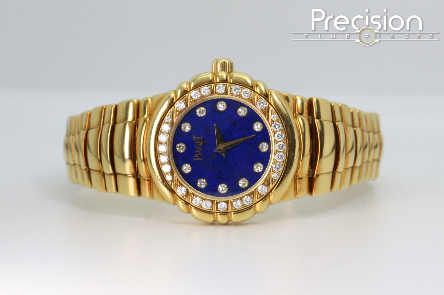 Piaget Tanagra Ref: 16033 M 401 D Quartz 33mm 18K Gold Lapis Dial