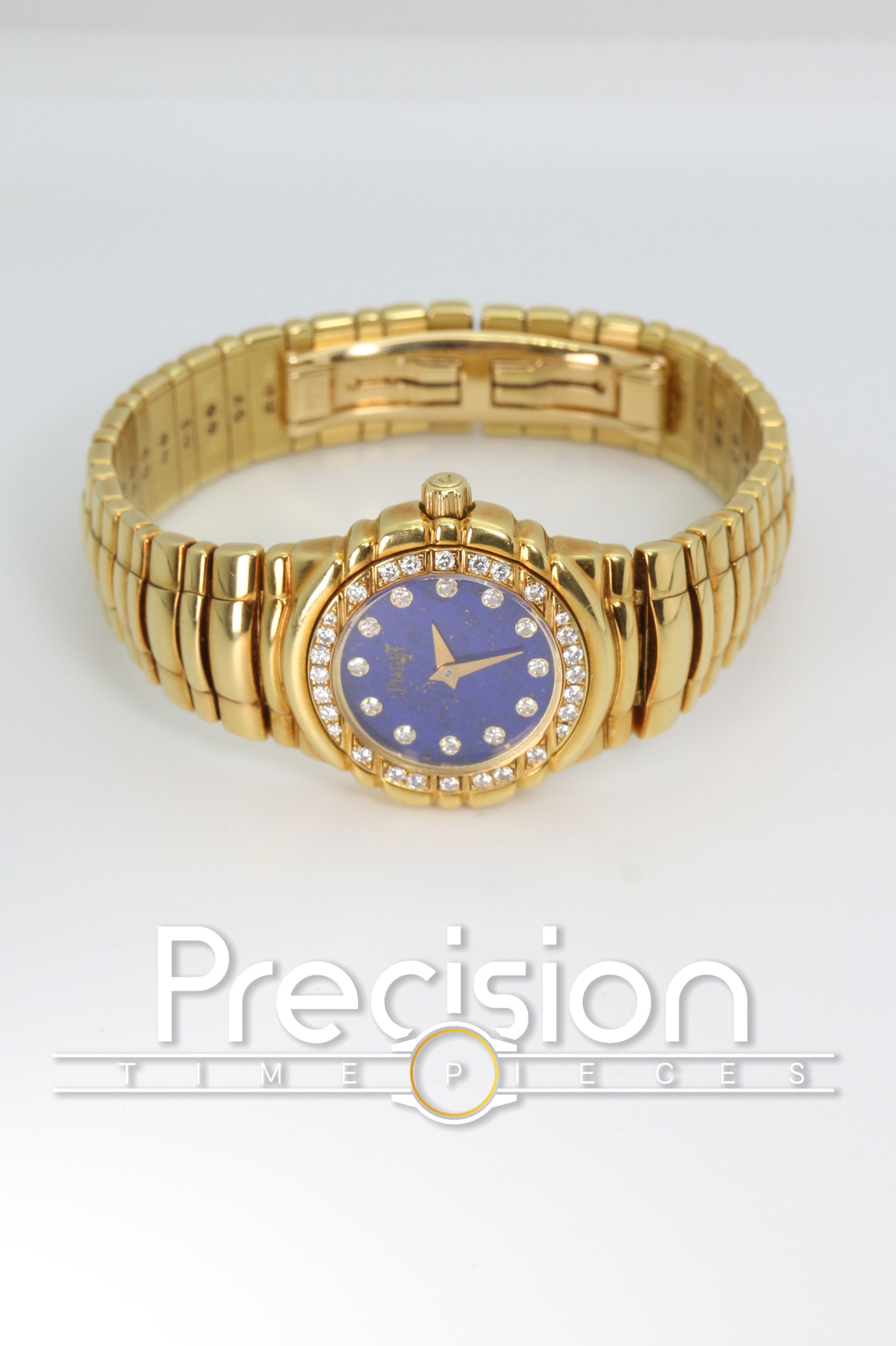 Piaget Tanagra Ref: 16033 M 401 D Quartz 33mm 18K Gold Lapis Dial