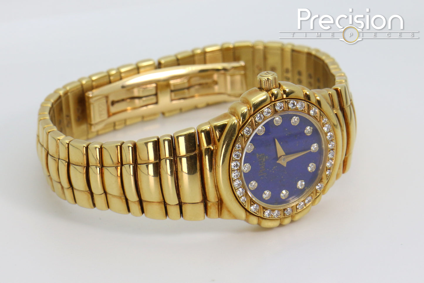 Piaget Tanagra Ref: 16033 M 401 D Quartz 33mm 18K Gold Lapis Dial
