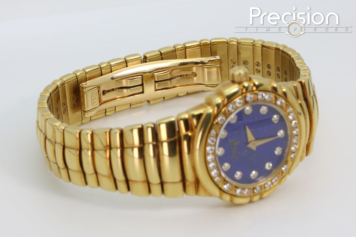 Piaget Tanagra Ref: 16033 M 401 D Quartz 33mm 18K Gold Lapis Dial