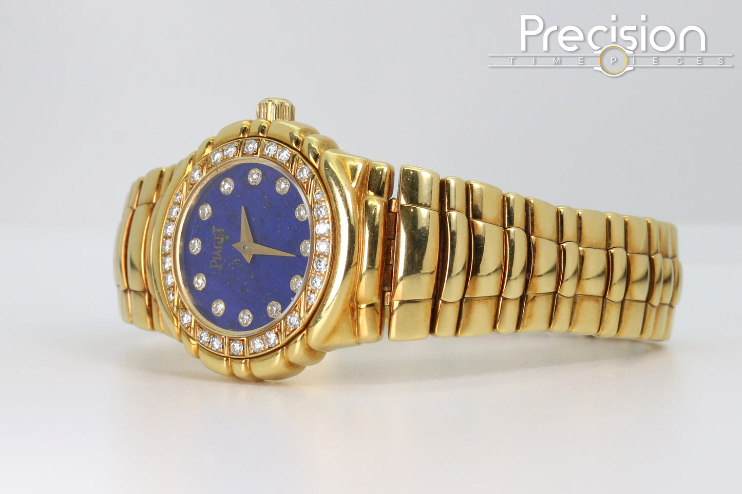 Piaget Tanagra Ref: 16033 M 401 D Quartz 33mm 18K Gold Lapis Dial